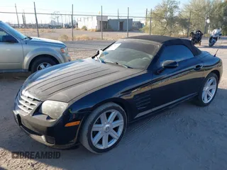 2005 Chrysler Crossfire with VIN 1C3AN55L55X051986, listed as a IAAI auction lot 41288735 with 97,853 mi miles and . Bid and sale history available at DreamBid. Image 2.