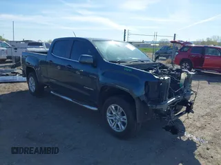 2019 GMC Canyon 4WD SLE z VIN 1GTG6CEN9K1128155, wystawiony jako IAAI lot #42157792 z przebiegiem 119 831 mil mil oraz . Historia ofert i sprzedaży dostępna na DreamBid. Obrazek 1.
