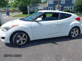 2013 Hyundai Veloster RE:MIX with VIN KMHTC6AD4DU173426, listed as a IAAI auction lot 42551270 with 91,560 mi miles and . Bid and sale history available at DreamBid. Image 6.