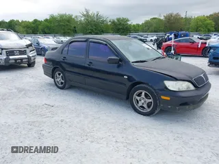 2002 Mitsubishi Lancer OZ-Rally with VIN JA3AJ86E22U074890, listed as a IAAI auction lot 42029591 with 235,818 mi miles. Bid and sale history available at carsss.com. Image 1.