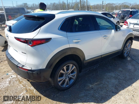 2022 Mazda CX-30 S Premium with VIN 3MVDMBDL1NM413540, listed as a IAAI auction lot 41681191 with 57,764 mi miles and . Bid and sale history available at carsss.com. Image 4.