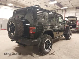 2021 Jeep Wrangler Unlimited Rubicon with VIN 1C4HJXFN2MW719135, listed as a IAAI auction lot 41835698 with 20,447 mi miles and . Bid and sale history available at DreamBid. Image 4.