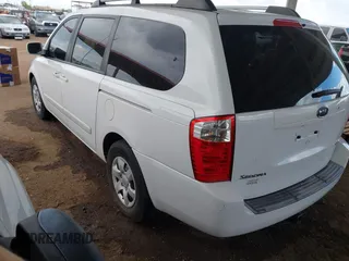 2007 Kia Sedona EX with VIN KNDMB233276111265, listed as a IAAI auction lot 41973188 with 197,754 mi miles. Bid and sale history available at carsss.com. Image 3.