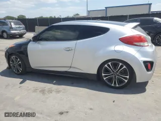 2014 Hyundai Veloster Turbo with VIN KMHTC6AE0EU192680, listed as a Copart auction lot 54486575 with 129,949 mi miles and Clean Title. Bid and sale history available at carsss.com. Image 2.