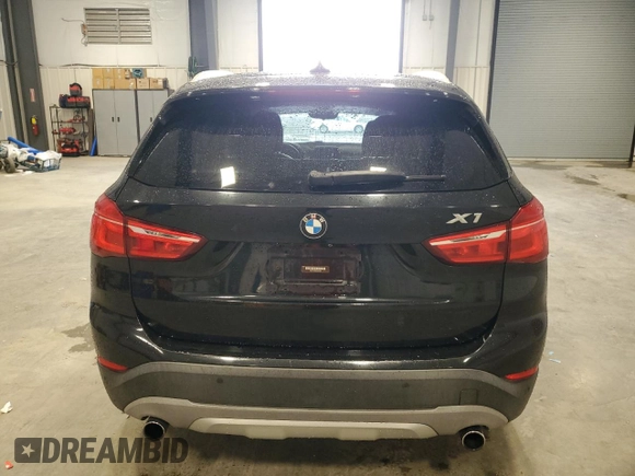 2017 BMW X1 xDrive28i with VIN WBXHT3Z39H4A51967, listed as a Copart auction lot 58843125 with 108,415 mi miles and Clean title. Bid and sale history available at DreamBid. Image 6.