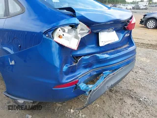 2018 Ford Fiesta SE z VIN 3FADP4BJXJM126168, wystawiony jako IAAI lot #42255261 z przebiegiem 121 248 mil mil oraz . Historia ofert i sprzedaży dostępna na DreamBid. Obrazek 6.