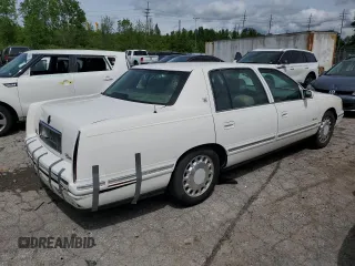 1999 Cadillac DeVille z VIN 1G6KD54Y7XU801251, wystawiony jako Copart lot #52819854 z przebiegiem 180 871 mil mil oraz Szkoda całkowita • Salvage title. Historia ofert i sprzedaży dostępna na DreamBid. Obrazek 3.
