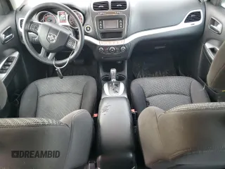 2013 Dodge Journey American Value with VIN 3C4PDCAB9DT604157, listed as a Copart auction lot 48206675 with 158,392 mi miles and Salvage Title. Bid and sale history available at DreamBid. Image 8.
