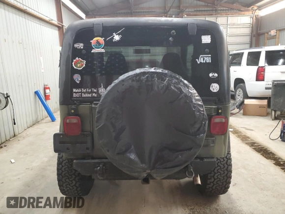 1997 Jeep Wrangler SE with VIN 1J4FY29PXVP476747, listed as a Copart auction lot 49218685 with 165,442 mi miles and Clean Title. Bid and sale history available at carsss.com. Image 6.