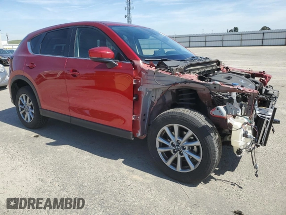 2023 Mazda CX-5 2.5 S Preferred Package with VIN JM3KFBCMXP0184897, listed as a Copart auction lot 50264135 with 28,556 mi miles and Salvage Title. Bid and sale history available at carsss.com. Image 4.