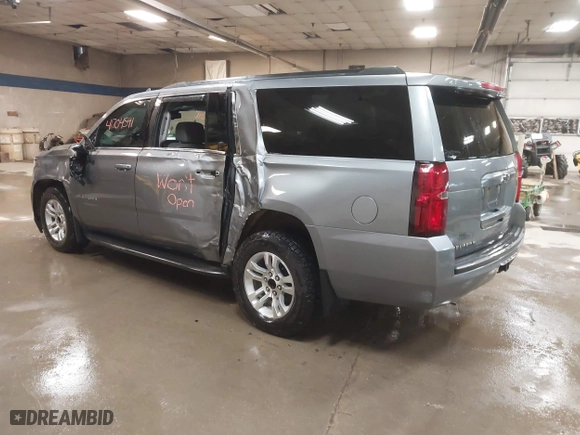 2019 Chevrolet Suburban LT with VIN 1GNSKHKC3KR195042, listed as a IAAI auction lot 41704591 with 107,166 mi miles. Bid and sale history available at carsss.com. Image 3.