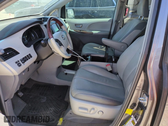 2013 Toyota Sienna XLE with VIN 5TDDK3DC4DS056852, listed as a Copart auction lot 64286005 with 171,561 mi miles and Clean title. Bid and sale history available at DreamBid. Image 7.