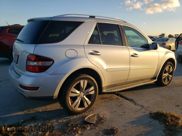 2009 Mercedes-Benz M 3.5L with VIN 4JGBB56EX9A521264, listed as a Copart auction lot 87000234 with 239,700 mi miles and Clean Title. Bid and sale history available at carsss.com. Image 3.
