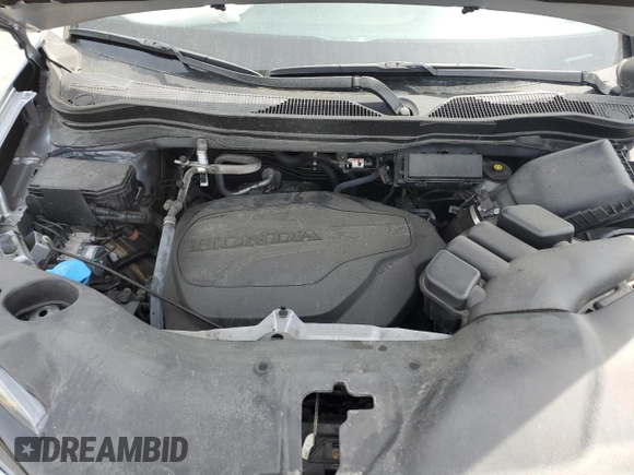 2022 Honda Pilot TrailSport z VIN 5FNYF6H80NB052736, wystawiony jako Copart lot #54579495 z przebiegiem 38 470 mil mil oraz Szkoda całkowita • Salvage title. Historia ofert i sprzedaży dostępna na DreamBid. Obrazek 11.