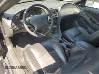 2002 Ford Mustang GT Deluxe z VIN 1FAFP45X22F101551, wystawiony jako Copart lot #55184645 z przebiegiem 137 971 mil mil oraz Szkoda całkowita • Salvage title. Historia ofert i sprzedaży dostępna na DreamBid. Obrazek 8.