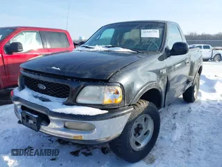 1997 Ford F-150 XL with VIN 1FTDF08W5VKD47103, listed as a IAAI auction lot 41345739 with 209,732 mi miles. Bid and sale history available at carsss.com. Image 17.