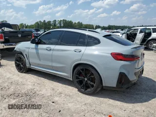 2022 BMW X4 M z VIN 5YM23EC02N9K87490, wystawiony jako Copart lot #65907114 z przebiegiem 55 555 mil mil oraz Szkoda całkowita • Salvage title. Historia ofert i sprzedaży dostępna na DreamBid. Obrazek 2.