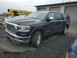 2022 Ram 1500 Laramie with VIN 1C6SRFJT7NN204631, listed as a Copart auction lot 51852815 with 166,699 mi miles and Salvage title. Bid and sale history available at DreamBid. Image 1.