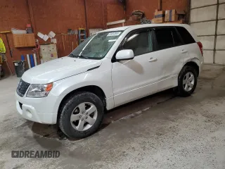 2012 Suzuki Grand Vitara Premium z VIN JS3TD0D66C4100845, wystawiony jako Copart lot #53454565 z przebiegiem 106 415 mil mil oraz Szkody całkowita. Historia ofert i sprzedaży dostępna na DreamBid. Obrazek 1.