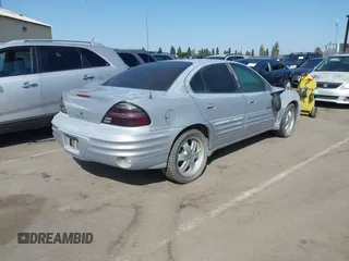 1999 Pontiac Grand Am SE with VIN 1G2NE52TXXC553246, listed as a IAAI auction lot 42398103 with Not provided miles and . Bid and sale history available at DreamBid. Image 4.