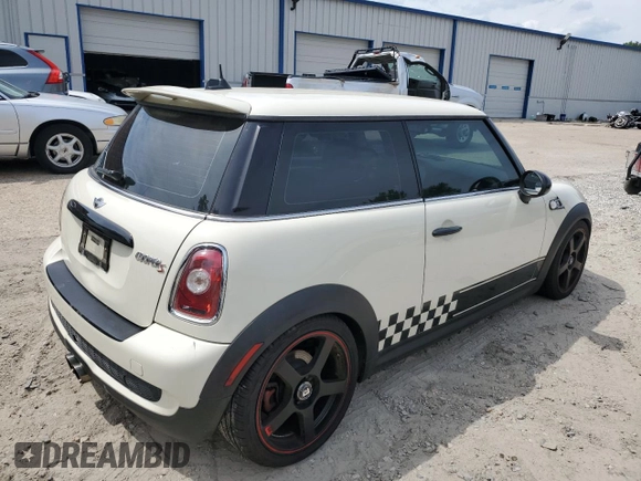 2007 MINI Hardtop S with VIN WMWMF73527TT83851, listed as a Copart auction lot 54740125 with 140,296 mi miles and Clean Title. Bid and sale history available at DreamBid. Image 3.