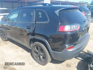 2021 Jeep Cherokee Altitude with VIN 1C4PJLLBXMD112667, listed as a IAAI auction lot 41959004 with 25,524 mi miles and . Bid and sale history available at DreamBid. Image 3.