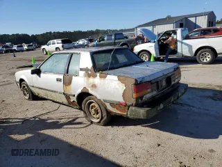 1984 Toyota Celica z VIN JT2RA64C7E6218560, wystawiony jako Copart lot #63087872 z przebiegiem 168 288 mil mil oraz Czysty tytuł • Clean title. Historia ofert i sprzedaży dostępna na DreamBid. Obrazek 3.