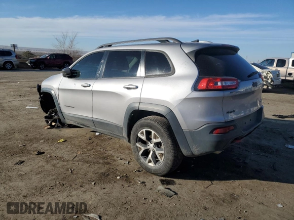 2018 Jeep Cherokee Trailhawk with VIN 1C4PJMBB9JD571773, listed as a Copart auction lot 82876514 with 137,565 mi miles and Salvage title. Bid and sale history available at DreamBid. Image 2.