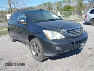 2007 Lexus RX 400h with VIN JTJGW31U372003129, listed as a IAAI auction lot 41769911 with 231,097 mi miles and . Bid and sale history available at DreamBid. Image 1.