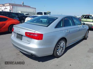 2012 Audi A6 Premium Plus with VIN WAUBGAFC1CN004574, listed as a IAAI auction lot 42335361 with 76,655 mi miles and . Bid and sale history available at DreamBid. Image 4.
