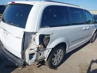 2014 Chrysler Town & Country Touring with VIN 2C4RC1BG4ER156134, listed as a IAAI auction lot 41978659 with 169,670 mi miles. Bid and sale history available at carsss.com. Image 4.