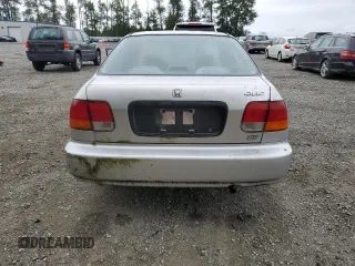 1996 Honda Civic DX z VIN 2HGEJ6521TH548106, wystawiony jako Copart lot #62088455 z przebiegiem 195 790 mil mil oraz Czysty tytuł • Clean title. Historia ofert i sprzedaży dostępna na DreamBid. Obrazek 6.