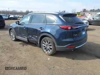 2021 Mazda CX-9 Grand Touring with VIN JM3TCBDY7M0540359, listed as a IAAI auction lot 41711366 with 47,391 mi miles and . Bid and sale history available at carsss.com. Image 3.