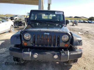 2013 Jeep Wrangler Sport with VIN 1C4AJWAG0DL618634, listed as a Copart auction lot 48982315 with 251,955 mi miles and Clean Title. Bid and sale history available at carsss.com. Image 5.