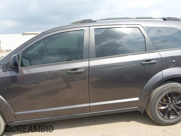 2019 Dodge Journey SE with VIN 3C4PDCBBXKT860142, listed as a IAAI auction lot 42126997 with 101,675 mi miles and . Bid and sale history available at DreamBid. Image 14.