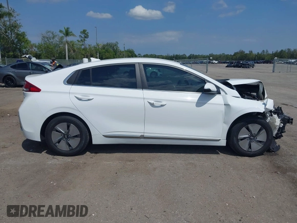 2022 Hyundai Ioniq SE z VIN KMHC75LC1NU282432, wystawiony jako IAAI lot #42060104 z przebiegiem 35 700 mil mil oraz . Historia ofert i sprzedaży dostępna na DreamBid. Obrazek 14.