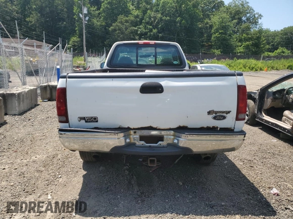 2000 Ford F-150 XL с VIN 1FTPF18L2YNA18807, выставлен на аукционе Copart как лот 62648305 с пробегом Не указан миль и Списание • Salvage title. История ставок и продаж доступна на DreamBid. Изображение 6.