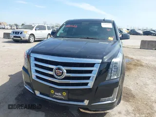 2015 Cadillac Escalade Luxury z VIN 1GYS4BKJ6FR291441, wystawiony jako IAAI lot #41881022 z przebiegiem 128 659 mil mil oraz . Historia ofert i sprzedaży dostępna na DreamBid. Obrazek 6.