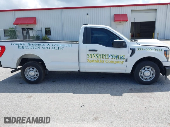2023 Ford F-150 XL with VIN 1FTMF1CP7PKF84555, listed as a IAAI auction lot 42197597 with 12,216 mi miles and . Bid and sale history available at DreamBid. Image 14.