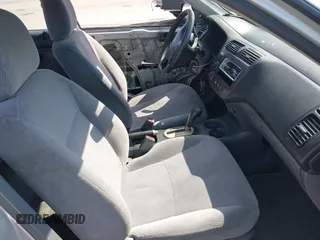 2001 Honda Civic LX with VIN 2HGES16591H619719, listed as a IAAI auction lot 42183571 with 294,983 mi miles. Bid and sale history available at carsss.com. Image 5.