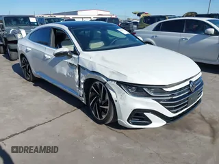2023 Volkswagen Arteon SEL Premium R-Line z VIN WVWTR7AN8PE003750, wystawiony jako IAAI lot #41763732 z przebiegiem 39 588 mil mil oraz . Historia ofert i sprzedaży dostępna na DreamBid. Obrazek 1.