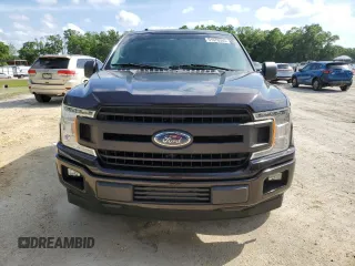 2018 Ford F-150 XL with VIN 1FTEX1CB0JFB12963, listed as a Copart auction lot 51076365 with 107,086 mi miles and Salvage Title. Bid and sale history available at carsss.com. Image 5.