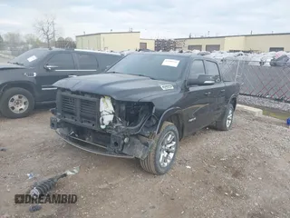 2022 Ram 1500 Laramie with VIN 1C6SRFJT6NN402536, listed as a IAAI auction lot 42109220 with 29,618 mi miles and . Bid and sale history available at DreamBid. Image 2.