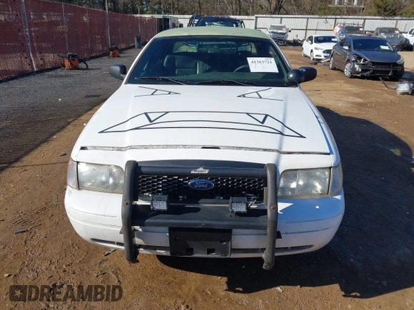 2005 Ford Police Interceptor z VIN 2FAFP71WX5X164985, wystawiony jako IAAI lot #41363721 z przebiegiem 147 950 mil mil oraz . Historia ofert i sprzedaży dostępna na DreamBid. Obrazek 12.