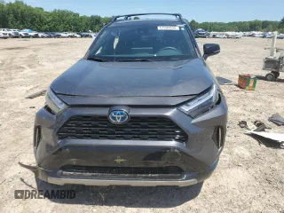 2023 Toyota RAV4 Hybrid XSE with VIN 2T3E6RFV9PW039963, listed as a Copart auction lot 57594335 with 27,486 mi miles and Salvage title. Bid and sale history available at DreamBid. Image 5.