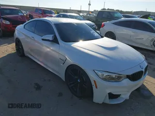 2015 BMW M4 with VIN WBS3R9C56FK332528, listed as a IAAI auction lot 41290555 with 86,495 mi miles. Bid and sale history available at carsss.com. Image 1.