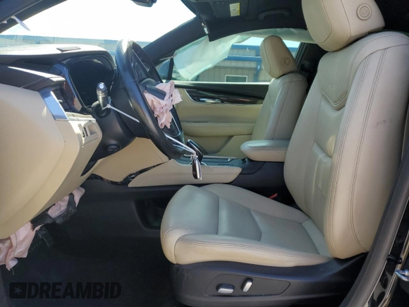 2019 Cadillac XT5 FWD with VIN 1GYKNARS9KZ219259, listed as a Copart auction lot 56900625 with 58,739 mi miles and Non repairable. Bid and sale history available at DreamBid. Image 7.