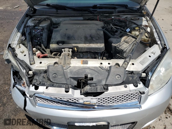 2014 Chevrolet Impala LT with VIN 2G1WB5E38E1124073, listed as a Copart auction lot 59691855 with 169,875 mi miles and Salvage title. Bid and sale history available at DreamBid. Image 11.