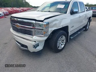 2014 Chevrolet Silverado 1500 High Country with VIN 3GCUKTEC4EG401571, listed as a IAAI auction lot 41984349 with 104,221 mi miles and . Bid and sale history available at DreamBid. Image 6.