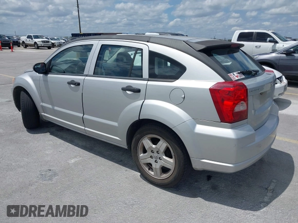 2008 Dodge Caliber SE with VIN 1B3HB28B98D757953, listed as a IAAI auction lot 42111663 with 115,977 mi miles. Bid and sale history available at carsss.com. Image 3.
